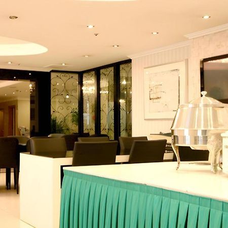 Hotel Olympic Чханвон Экстерьер фото